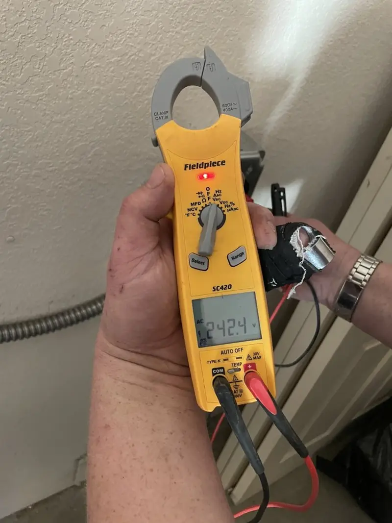 Voltage testing with clamp meter during Generator Installation in Jefferson